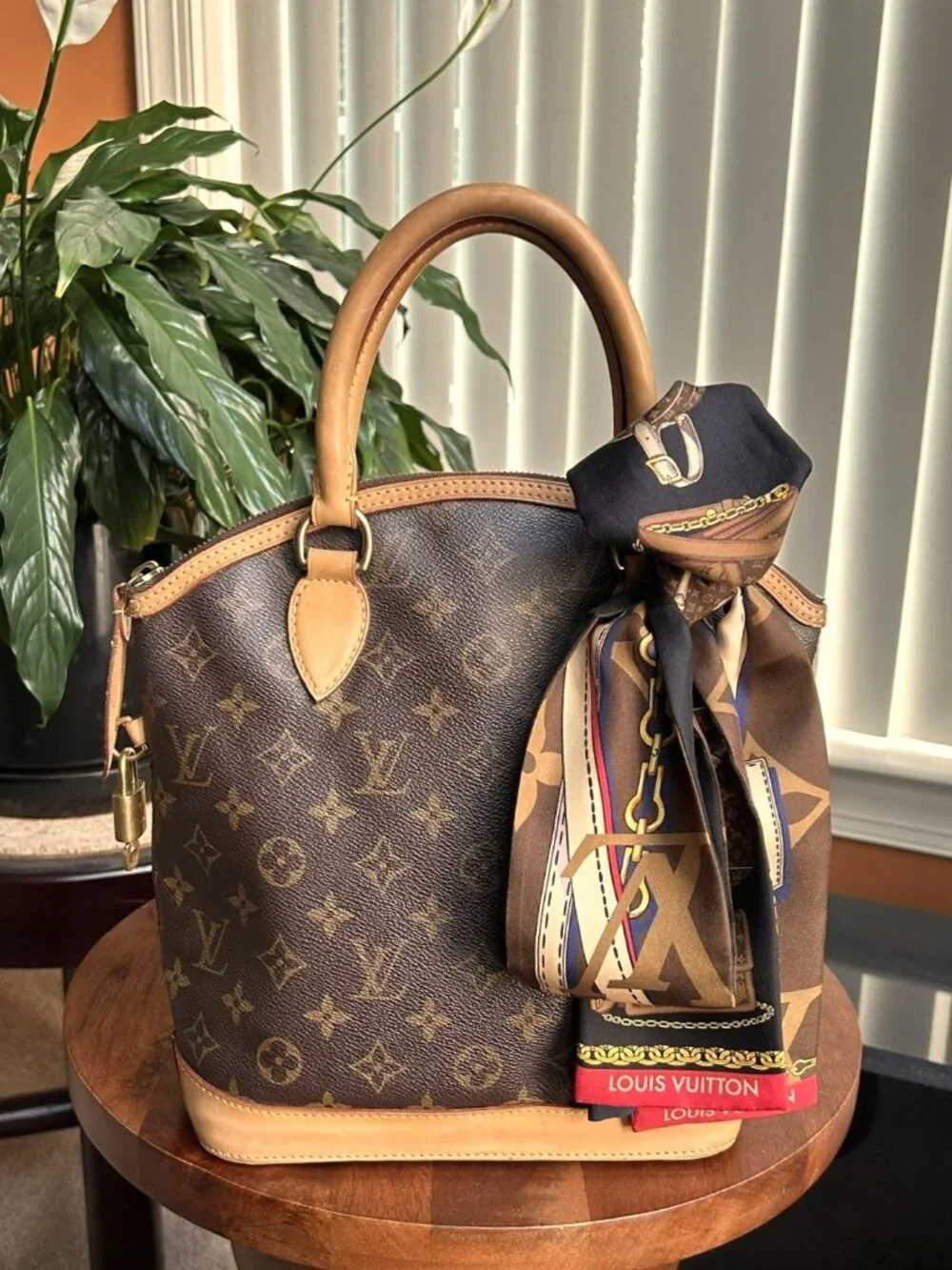 LOUIS VUITTON Monogram Lockit PM Bag